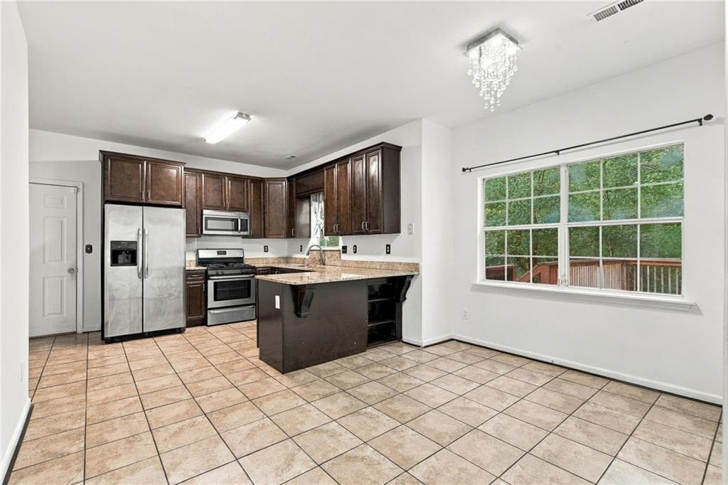 4 bedroom, 3 bathroom, 2,208 sq ft single family residence for sale at 2095 Enon Mill Drive, Atlanta, GA 30331 — photo 7