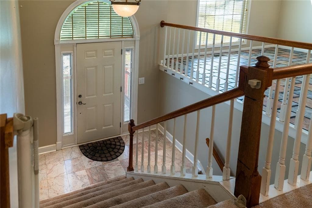 4 bedroom, 3 bathroom, 2,100 sq ft single family residence for sale at 1909 Brookhill Way, Snellville, GA 30078 — photo 2