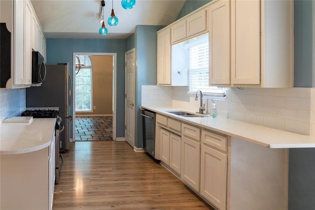 4 bedroom, 3 bathroom, 2,100 sq ft single family residence for sale at 1909 Brookhill Way, Snellville, GA 30078 — photo 3