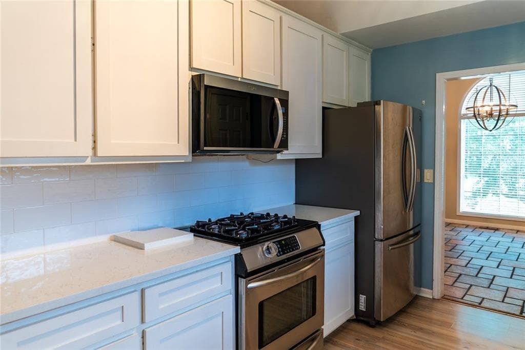 4 bedroom, 3 bathroom, 2,100 sq ft single family residence for sale at 1909 Brookhill Way, Snellville, GA 30078 — photo 6