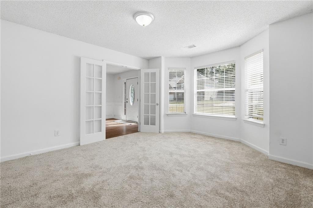 5 bedroom, 3 bathroom, 3,157 sq ft single family residence for sale at 645 Wildboar Court, Fairburn, GA 30213 — photo 3