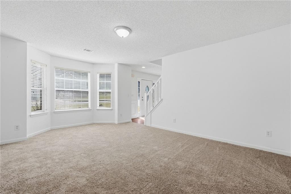 5 bedroom, 3 bathroom, 3,157 sq ft single family residence for sale at 645 Wildboar Court, Fairburn, GA 30213 — photo 7