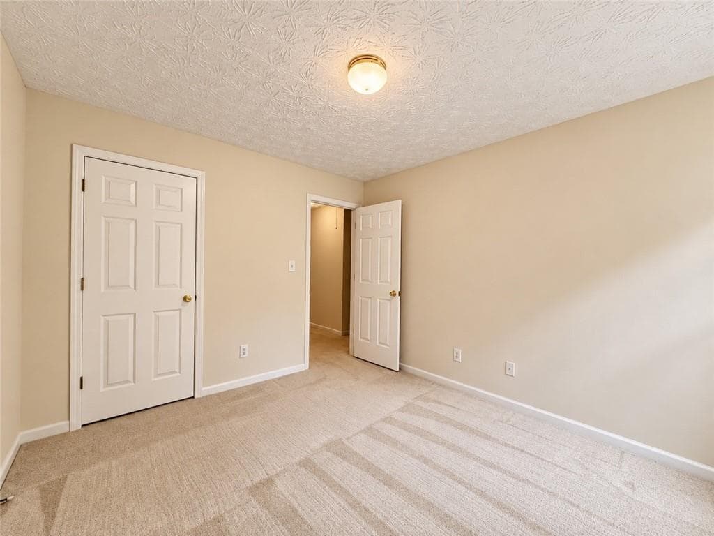 4 bedroom, 3 bathroom, 2,185 sq ft single family residence for sale at 4225 Ruby Forest Boulevard, Suwanee, GA 30024 — photo 10