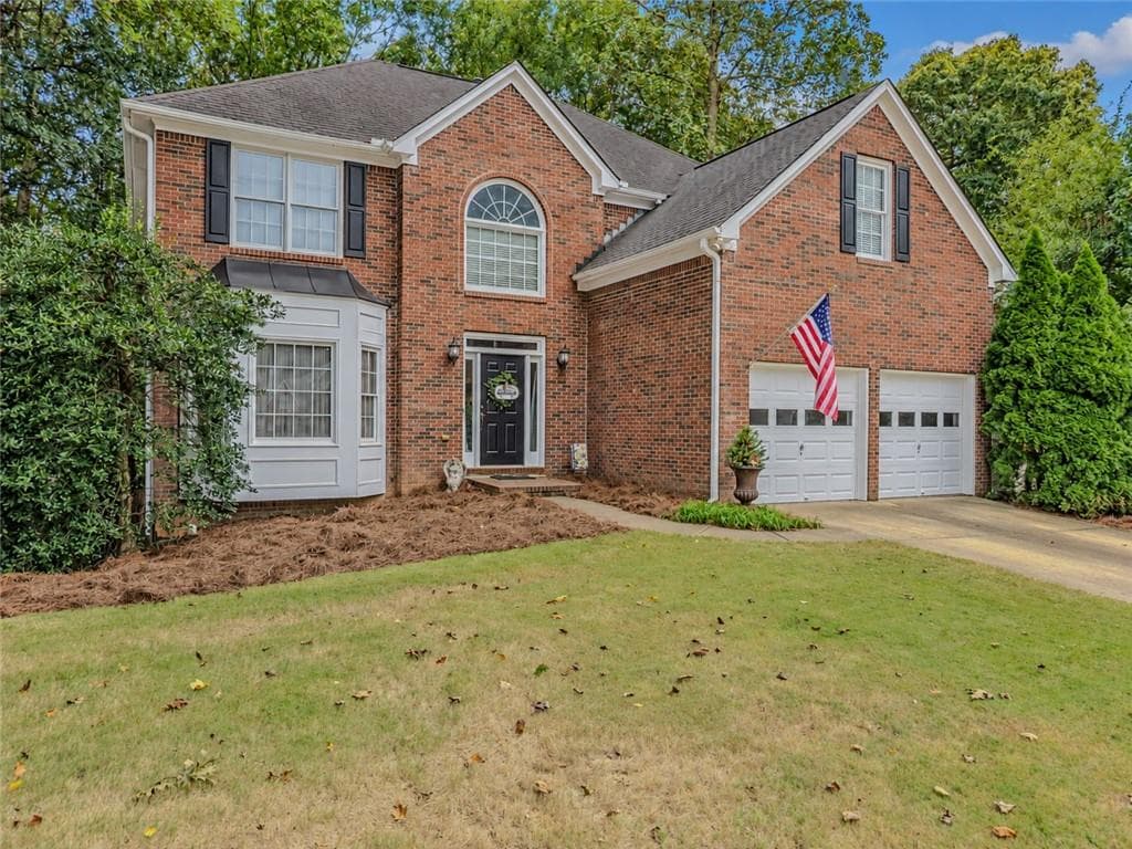 5 bedroom, 4 bathroom, 3,475 sq ft single family residence for sale at 973 Brookgreen Place, Lawrenceville, GA 30043 — photo 2