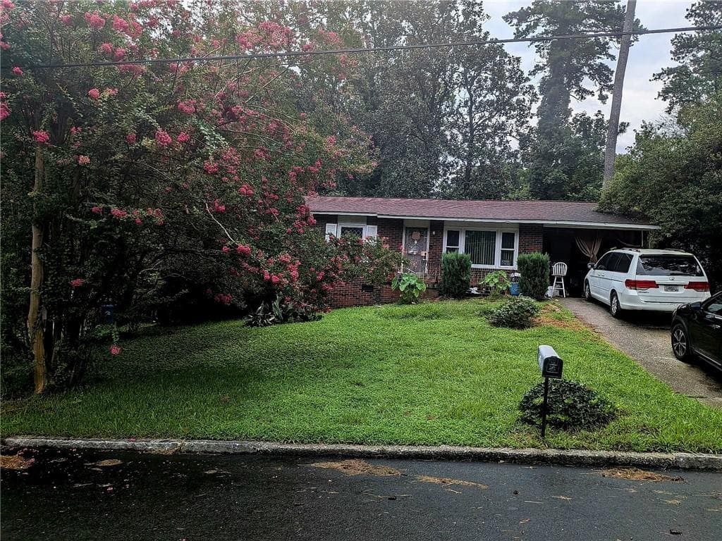 2 bedroom, 2 bathroom, 1,000 sq ft single family residence for sale at 127 Ellendale Lane, Atlanta, GA 30318 — photo 1 of 3