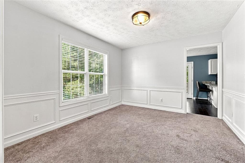 4 bedroom, 3 bathroom, 2,458 sq ft single family residence for sale at 1400 Walnut Hill Circle, Lawrenceville, GA 30043 — photo 6