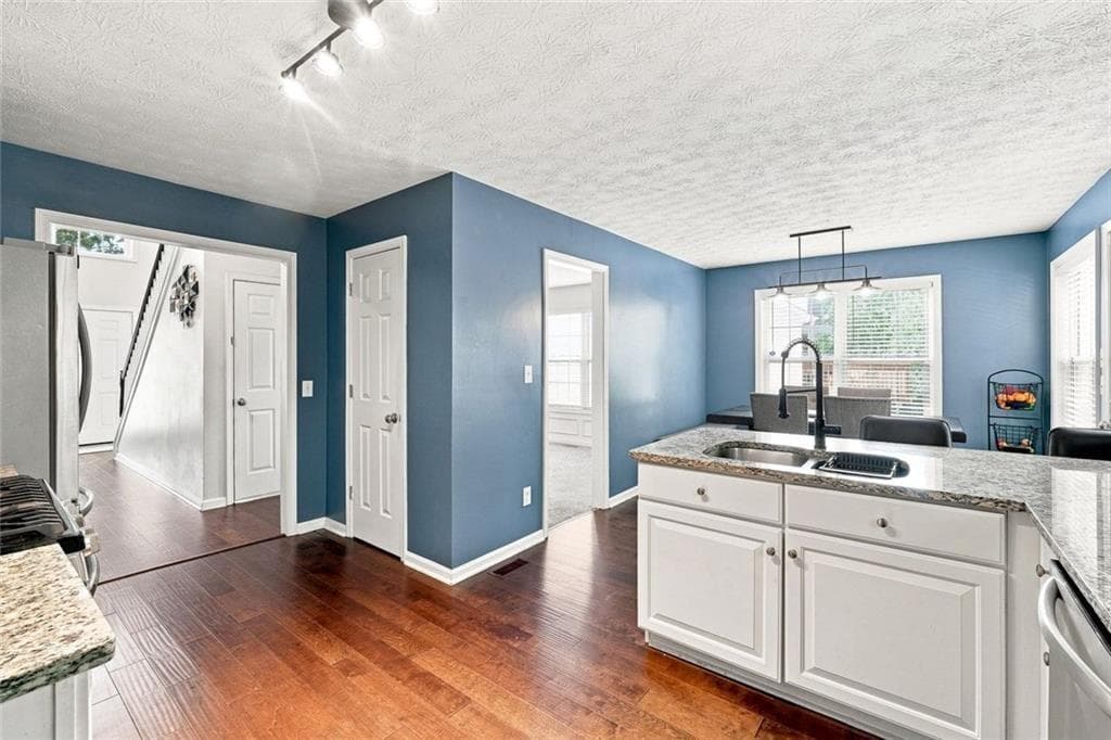 4 bedroom, 3 bathroom, 2,458 sq ft single family residence for sale at 1400 Walnut Hill Circle, Lawrenceville, GA 30043 — photo 8