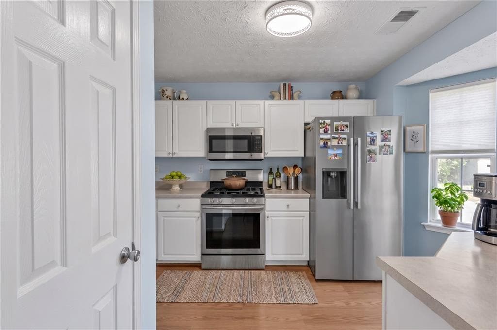 2 bedroom, 3 bathroom, 1,102 sq ft townhouse for sale at 3030 Jester Court, Duluth, GA 30096 — photo 5