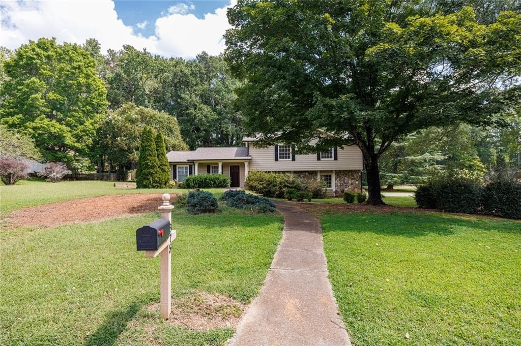 4 bedroom, 2 bathroom, 2,844 sq ft single family residence for sale at 875 Windsor Trail, Roswell, GA 30076