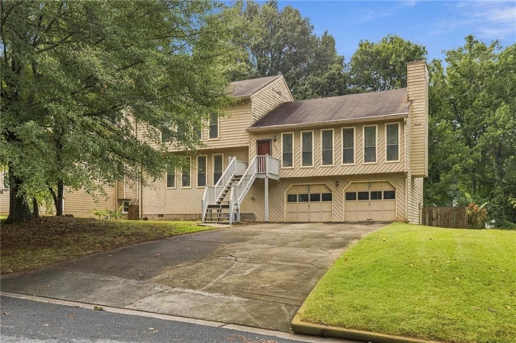 4 bedroom, 3 bathroom, 2,460 sq ft single family residence for sale at 371 Saint Simons Cove, Lawrenceville, GA 30044 — photo 2