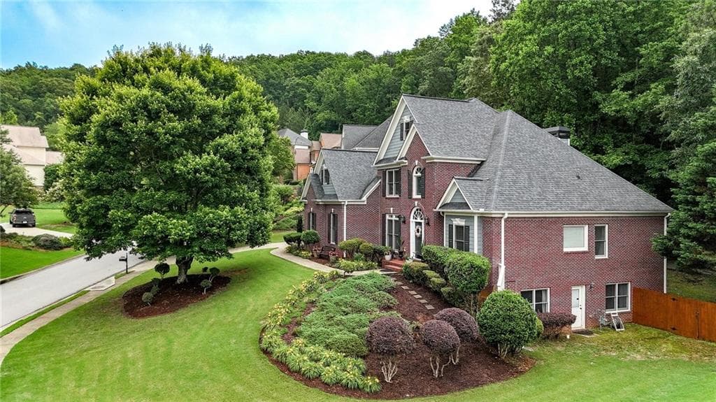 6 bedroom, 4 bathroom, 3,865 sq ft single family residence for sale at 4010 Northridge Drive, Cumming, GA 30040 — photo 2