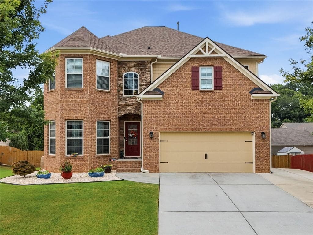 5 bedroom, 4 bathroom, 5,577 sq ft single family residence for sale at 2180 Cain Commons Drive, Dacula, GA 30019 — photo 2