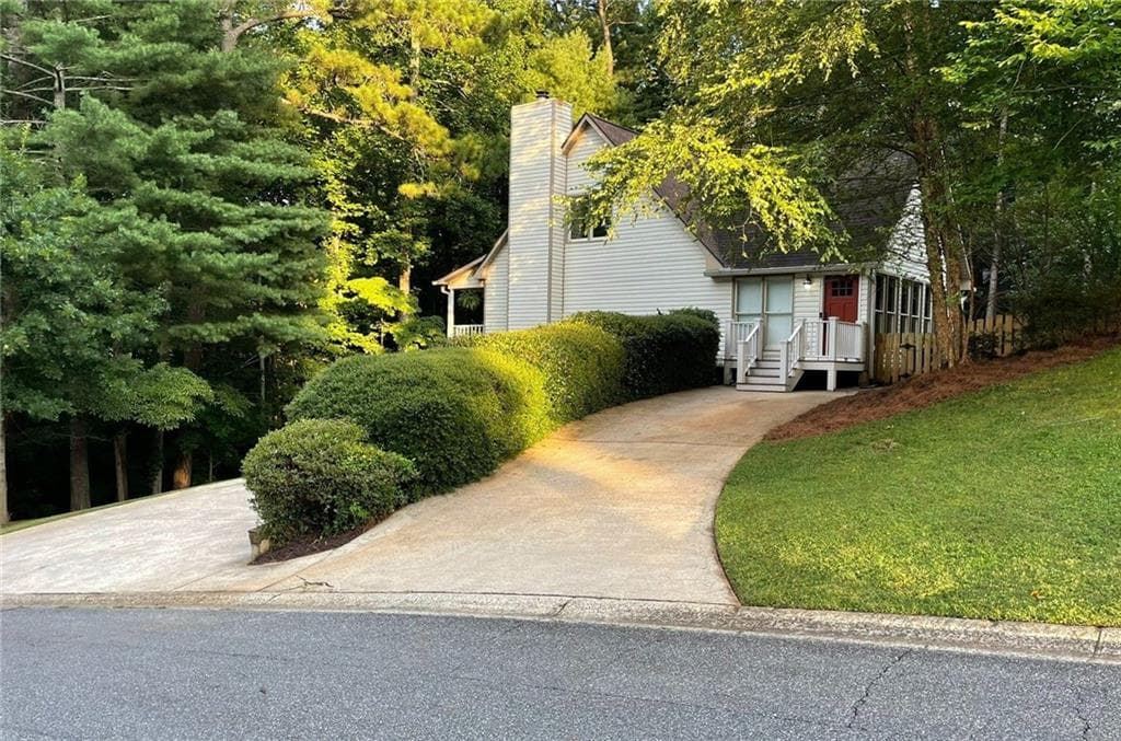4 bedroom, 3 bathroom, 2,844 sq ft single family residence for sale at 1024 Laurel Lake Drive, Ball Ground, GA 30107 — photo 2
