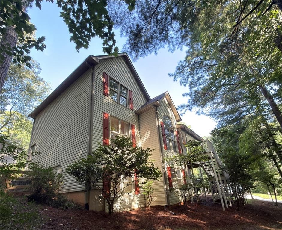 4 bedroom, 3 bathroom, 2,844 sq ft single family residence for sale at 1024 Laurel Lake Drive, Ball Ground, GA 30107 — photo 3
