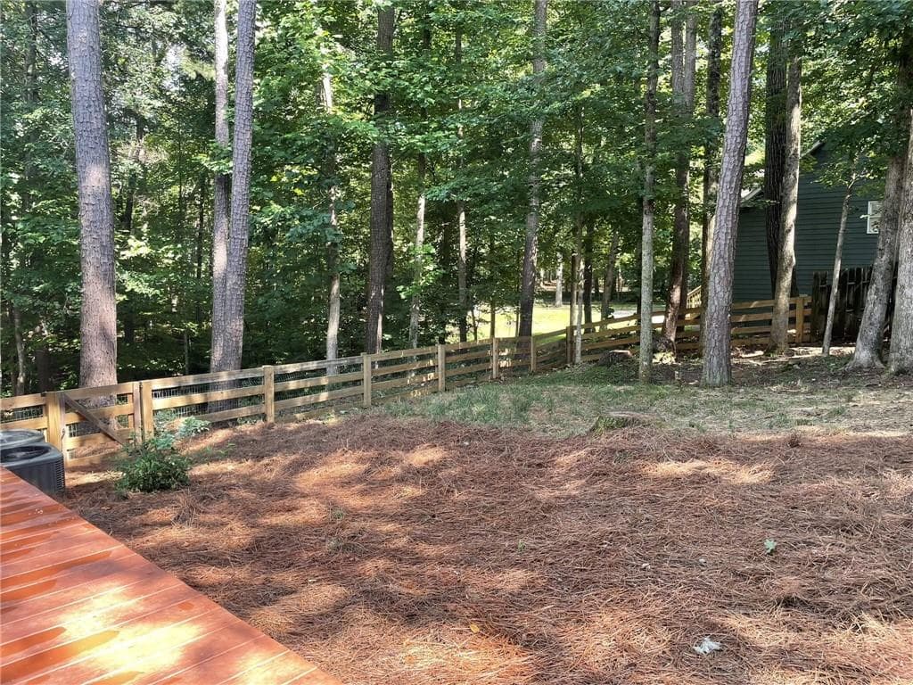 4 bedroom, 3 bathroom, 2,844 sq ft single family residence for sale at 1024 Laurel Lake Drive, Ball Ground, GA 30107 — photo 6