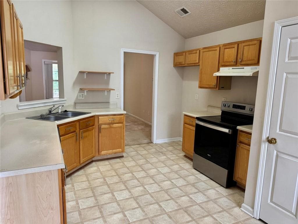 4 bedroom, 2 bathroom, 1,720 sq ft single family residence for sale at 1431 Log Cabin Lane, Lawrenceville, GA 30045 — photo 3