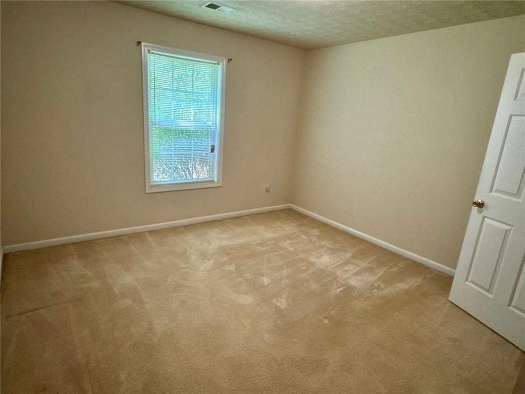 4 bedroom, 2 bathroom, 1,720 sq ft single family residence for sale at 1431 Log Cabin Lane, Lawrenceville, GA 30045 — photo 5