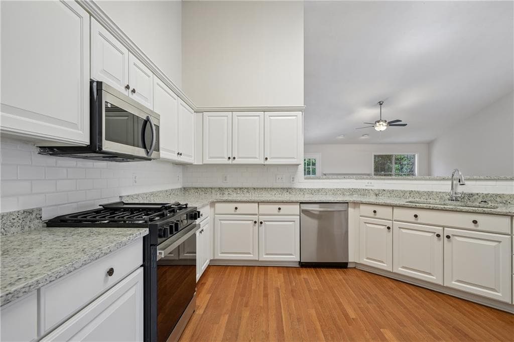 4 bedroom, 2 bathroom, 4,584 sq ft single family residence for sale at 3493 Dunbar Lane, Suwanee, GA 30024 — photo 2