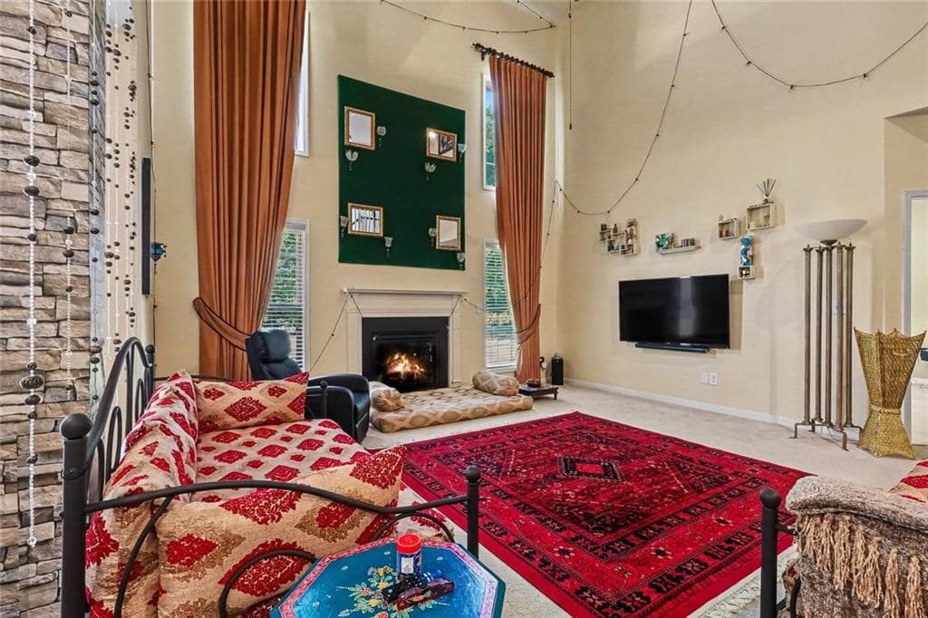 4 bedroom, 3 bathroom, 2,936 sq ft single family residence for sale at 3732 Lake Enclave Way, Atlanta, GA 30349 — photo 2