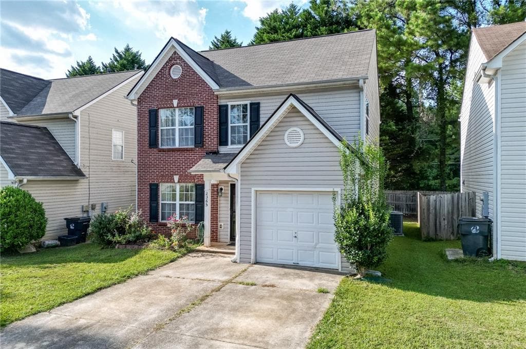 4 bedroom, 3 bathroom, 1,593 sq ft single family residence for sale at 2365 Delfern Drive, Lawrenceville, GA 30044 — photo 2