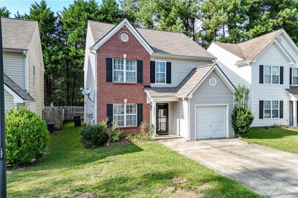 4 bedroom, 3 bathroom, 1,593 sq ft single family residence for sale at 2365 Delfern Drive, Lawrenceville, GA 30044 — photo 3