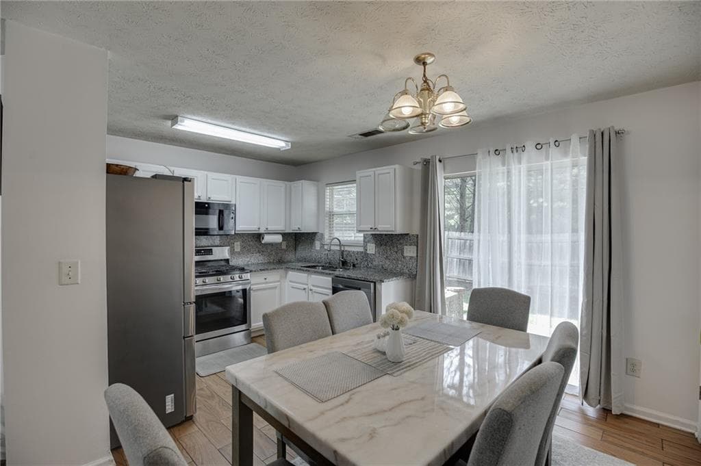 4 bedroom, 3 bathroom, 1,593 sq ft single family residence for sale at 2365 Delfern Drive, Lawrenceville, GA 30044 — photo 9
