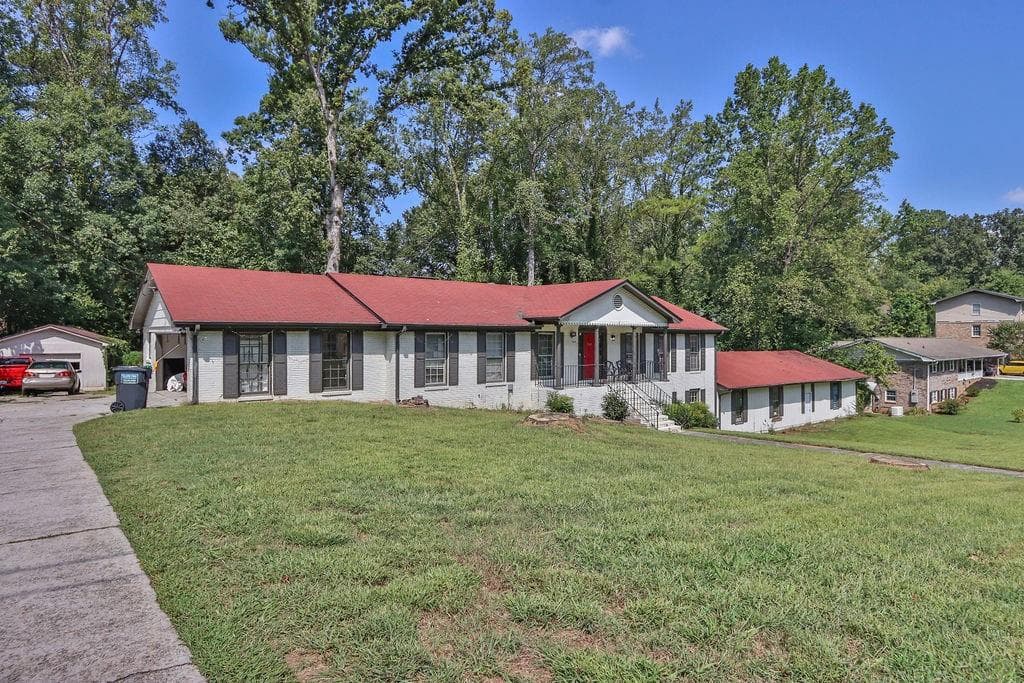7 bedroom, 2 bathroom, 3,709 sq ft single family residence for sale at 5645 Nottingham Drive, Lilburn, GA 30047