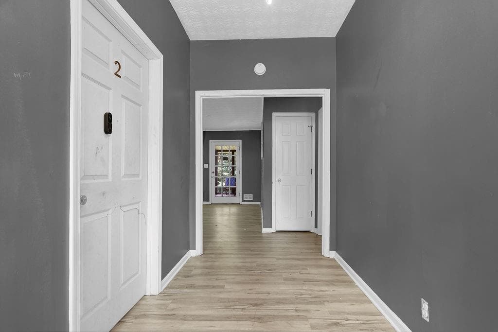7 bedroom, 2 bathroom, 3,709 sq ft single family residence for sale at 5645 Nottingham Drive, Lilburn, GA 30047 — photo 7
