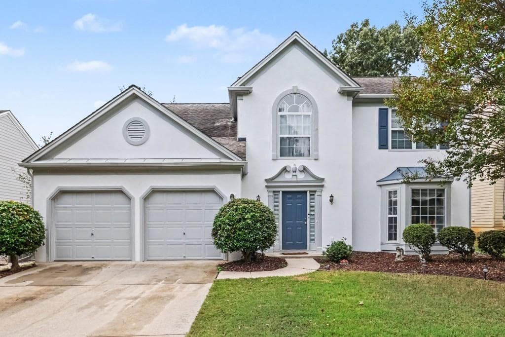 4 bedroom, 3 bathroom, 2,378 sq ft single family residence for sale at 5905 Haterleigh Drive, Johns Creek, GA 30005 — photo 2
