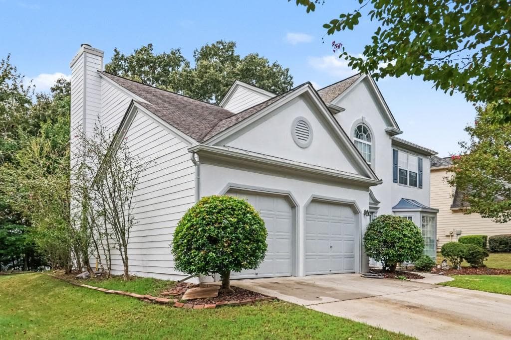 4 bedroom, 3 bathroom, 2,378 sq ft single family residence for sale at 5905 Haterleigh Drive, Johns Creek, GA 30005 — photo 3