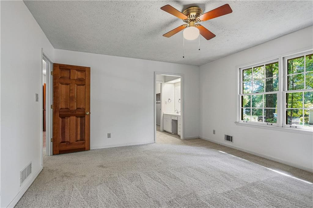 4 bedroom, 3 bathroom, 3,760 sq ft single family residence for sale at 585 Buckeye Circle, Conyers, GA 30094 — photo 4