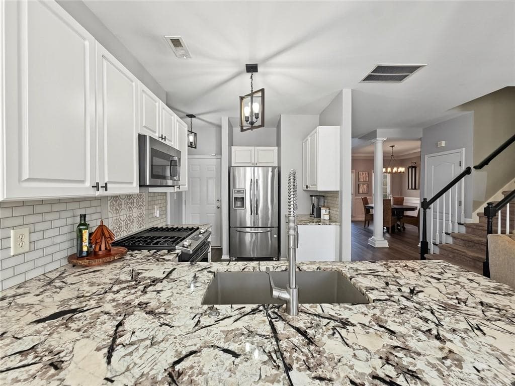 5 bedroom, 3 bathroom, 2,458 sq ft single family residence for sale at 314 Mirramont Court, Woodstock, GA 30189 — photo 10
