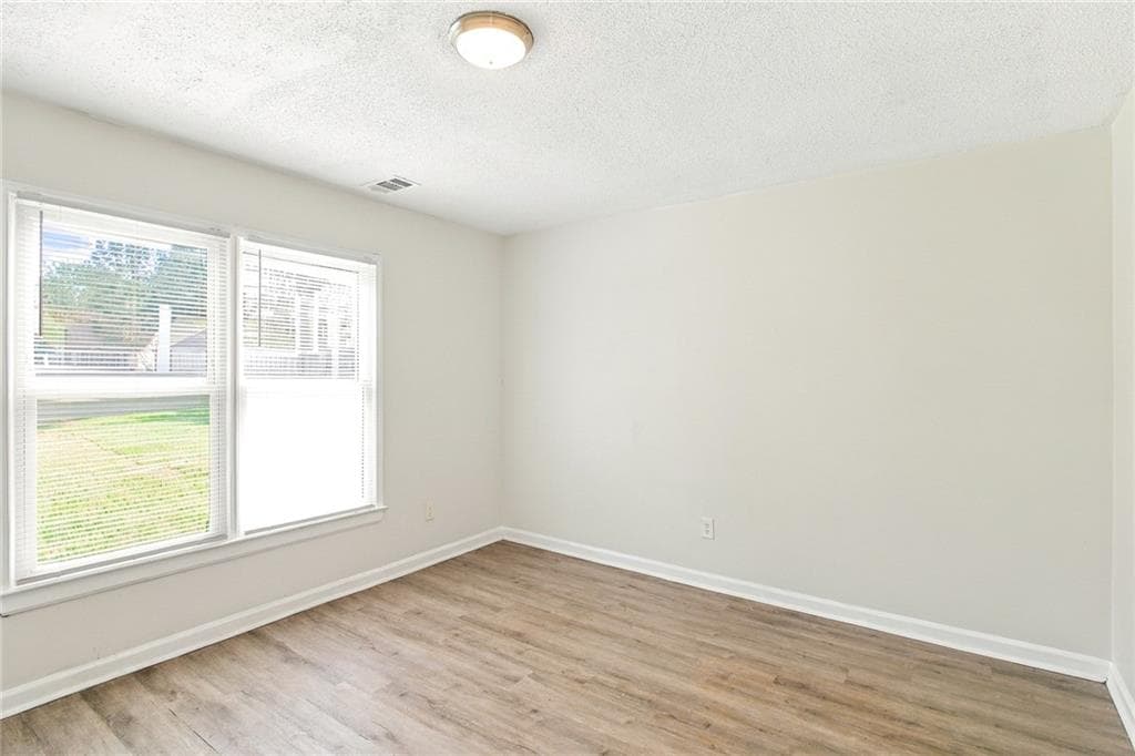 3 bedroom, 2 bathroom, 1,436 sq ft single family residence for rent at 7980 Woodlake Drive, Riverdale, GA 30274 for $1,940 a month — photo 7
