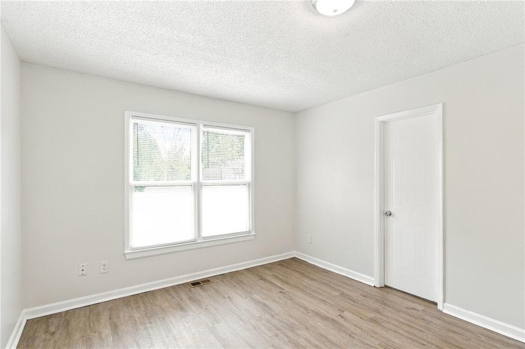 3 bedroom, 2 bathroom, 1,436 sq ft single family residence for rent at 7980 Woodlake Drive, Riverdale, GA 30274 for $1,940 a month — photo 9