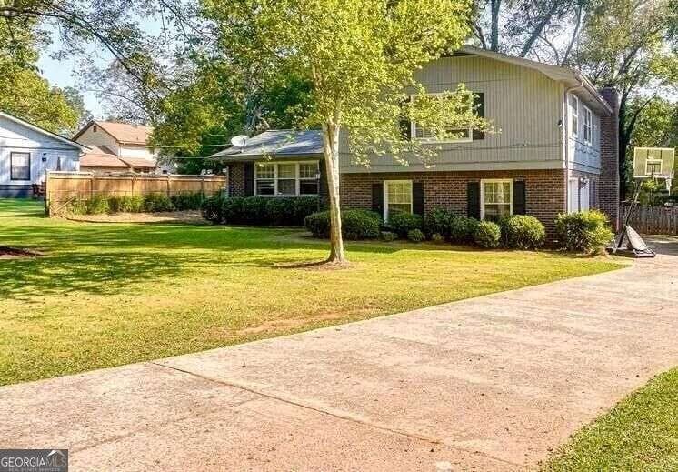 4 bedroom, 3 bathroom, 1,898 sq ft single family residence for sale at 2910 Stanton Rd SE, Conyers, GA 30094 — photo 1 of 11