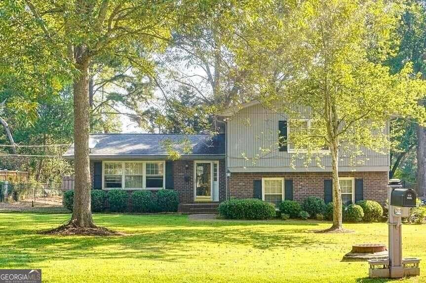 4 bedroom, 3 bathroom, 1,898 sq ft single family residence for sale at 2910 Stanton Rd SE, Conyers, GA 30094 — photo 2