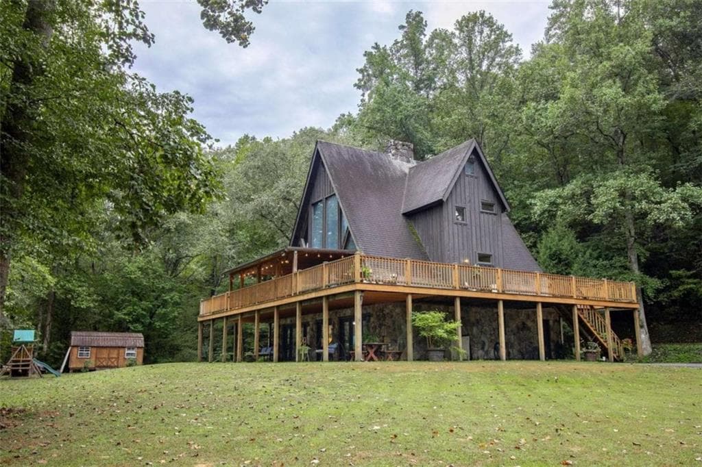 4 bedroom, 3 bathroom, 2,983 sq ft single family residence for sale at 525 Riverside Drive, East Ellijay, GA 30540 — photo 2