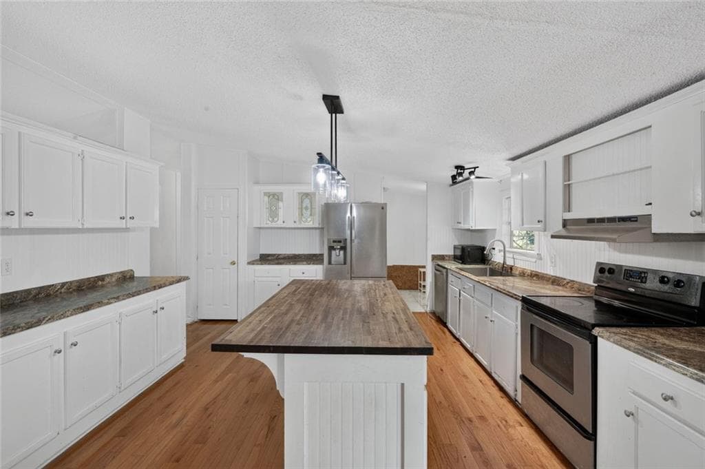 4 bedroom, 2 bathroom, 2,432 sq ft single family residence for sale at 133 Garden Ridge Drive, Carrollton, GA 30116 — photo 2