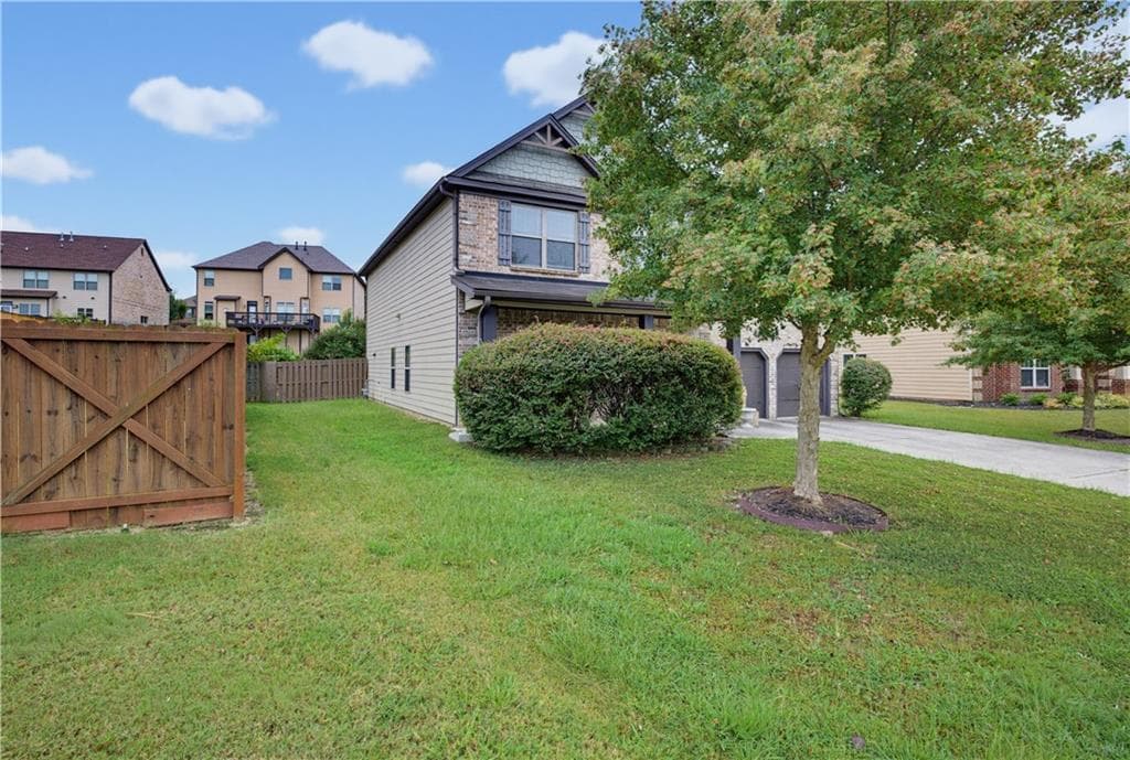 4 bedroom, 3 bathroom, 3,280 sq ft single family residence for sale at 1060 Del Mar Club Drive, Dacula, GA 30019 — photo 3