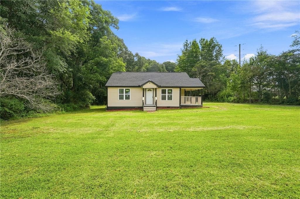3 bedroom, 1 bathroom, 1,060 sq ft single family residence for sale at 1061 Highway 3 N, Hampton, GA 30228 — photo 2