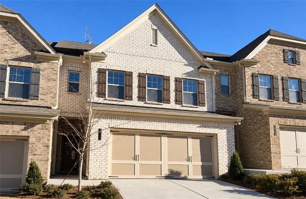 3 bedroom, 3 bathroom, 1,910 sq ft townhouse for sale at 1352 Elderwood Way, Cumming, GA 30041 — photo 1 of 11