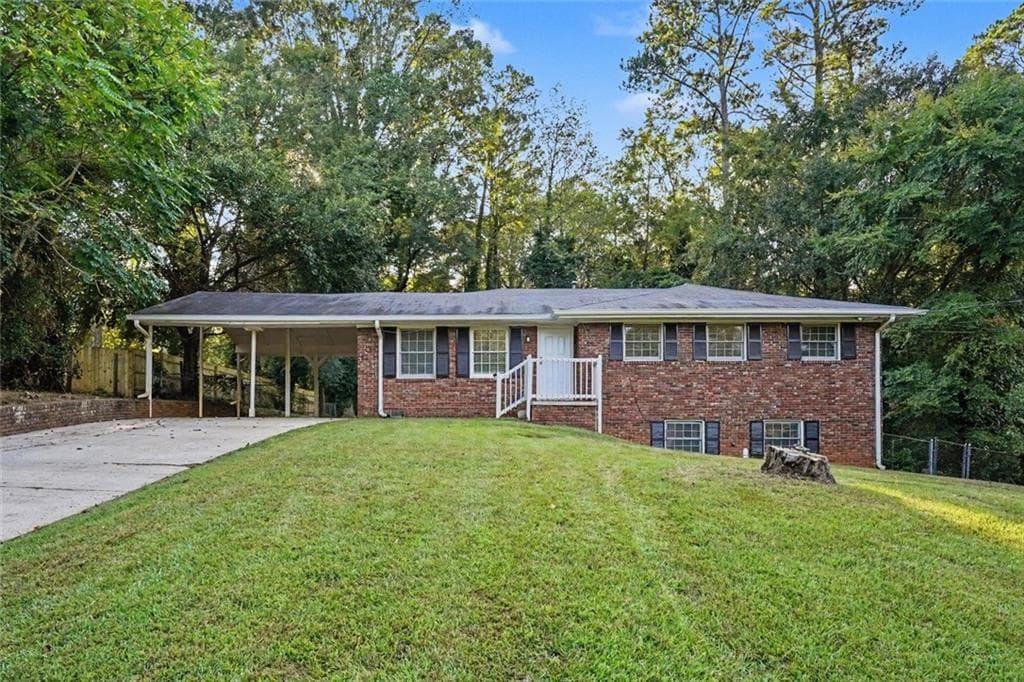 4 bedroom, 3 bathroom, 1,844 sq ft single family residence for sale at 4077 Rockey Valley Drive, Conley, GA 30288 — photo 2