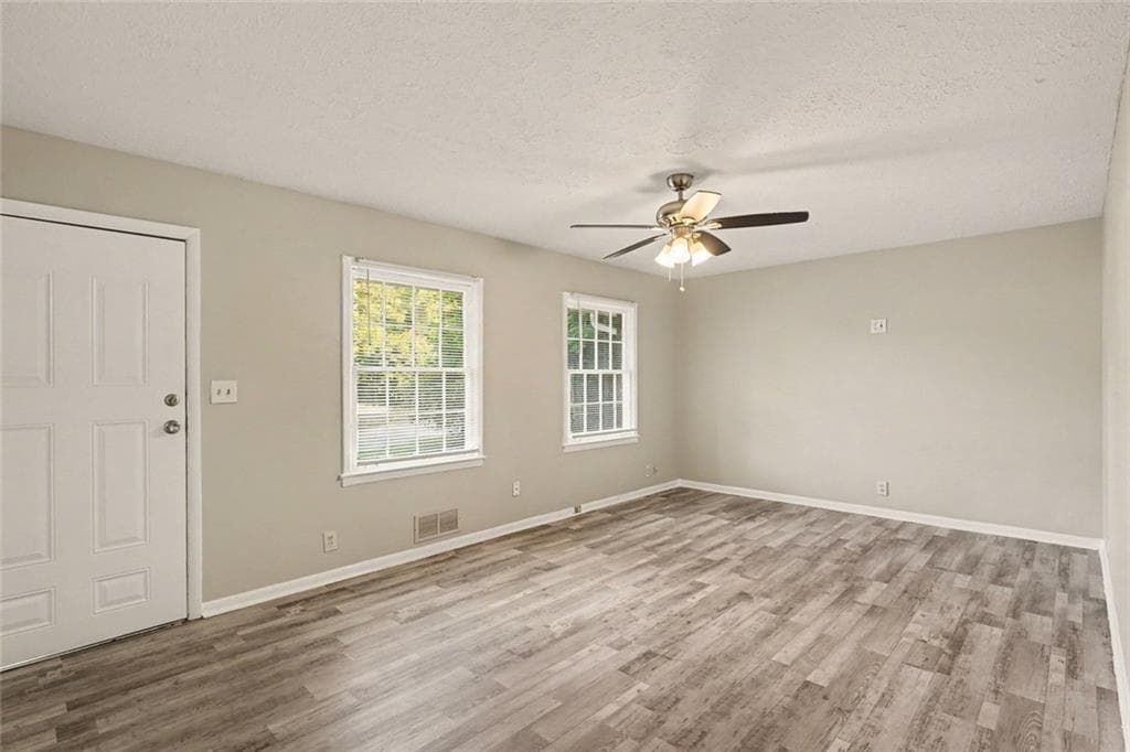 4 bedroom, 3 bathroom, 1,844 sq ft single family residence for sale at 4077 Rockey Valley Drive, Conley, GA 30288 — photo 4