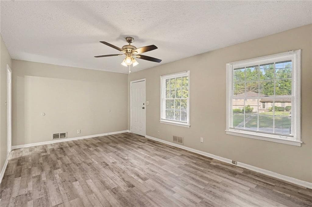 4 bedroom, 3 bathroom, 1,844 sq ft single family residence for sale at 4077 Rockey Valley Drive, Conley, GA 30288 — photo 5