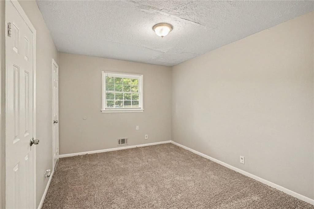 4 bedroom, 3 bathroom, 1,844 sq ft single family residence for sale at 4077 Rockey Valley Drive, Conley, GA 30288 — photo 8