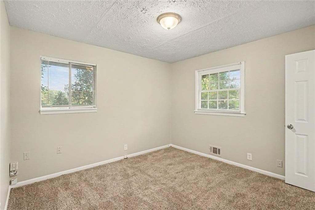 4 bedroom, 3 bathroom, 1,844 sq ft single family residence for sale at 4077 Rockey Valley Drive, Conley, GA 30288 — photo 10