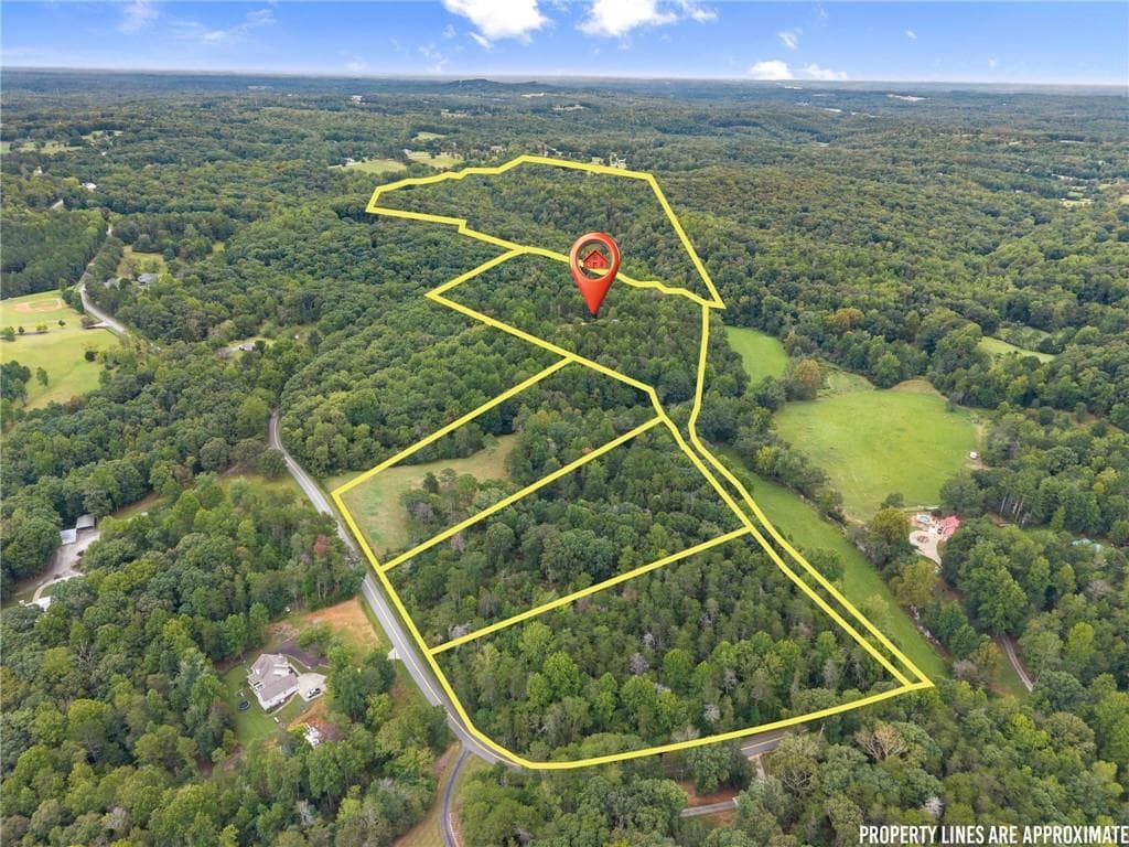 4 bedroom, 2 bathroom, 1,438 sq ft single family residence for sale at 7099 George Barnes Road, Murrayville, GA 30564 — photo 3