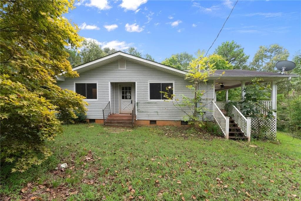 4 bedroom, 2 bathroom, 1,438 sq ft single family residence for sale at 7099 George Barnes Road, Murrayville, GA 30564 — photo 5