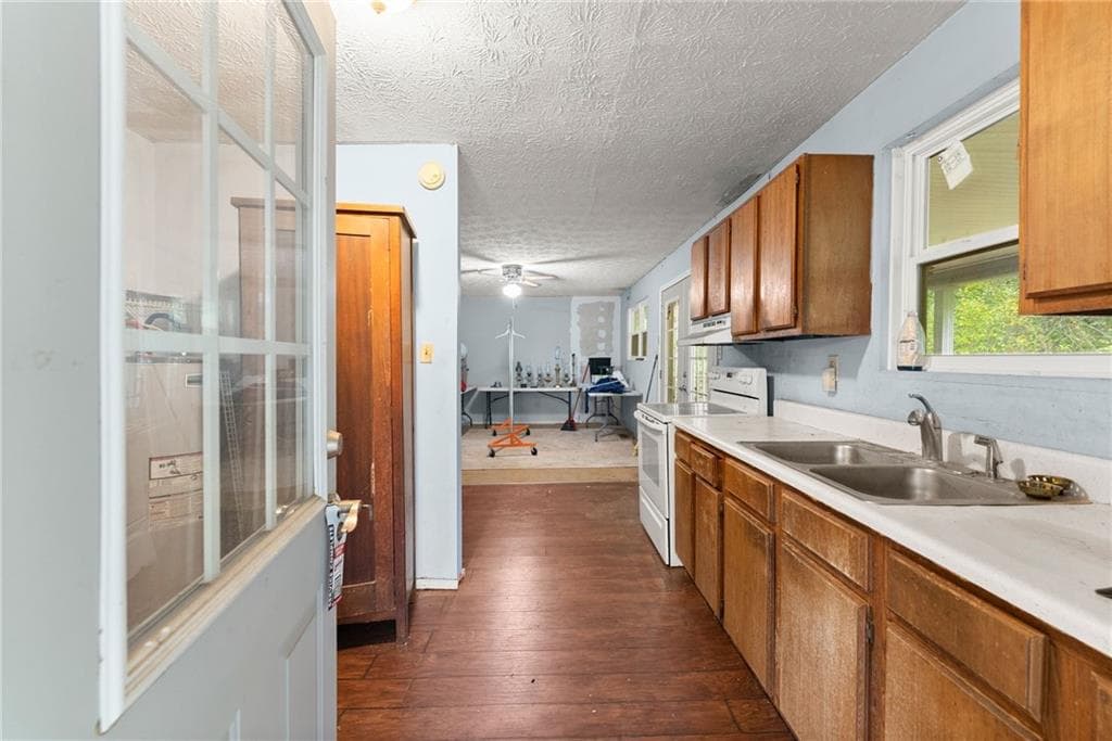 4 bedroom, 2 bathroom, 1,438 sq ft single family residence for sale at 7099 George Barnes Road, Murrayville, GA 30564 — photo 7