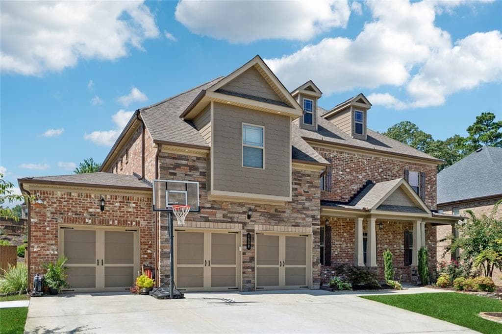 5 bedroom, 4 bathroom, 4,076 sq ft single family residence for rent at 4530 Point Rock Drive, Buford, GA 30519 for $3,695 a month — photo 1 of 25